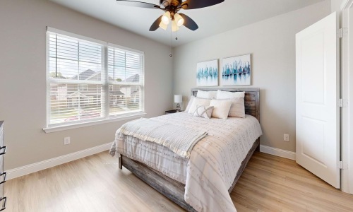 a bedroom with a large bed