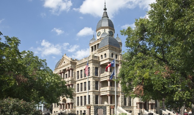 a building with flags in front of it